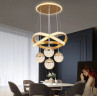 Подвесная люстра на 4 шара и кольцо. Цвет золото 